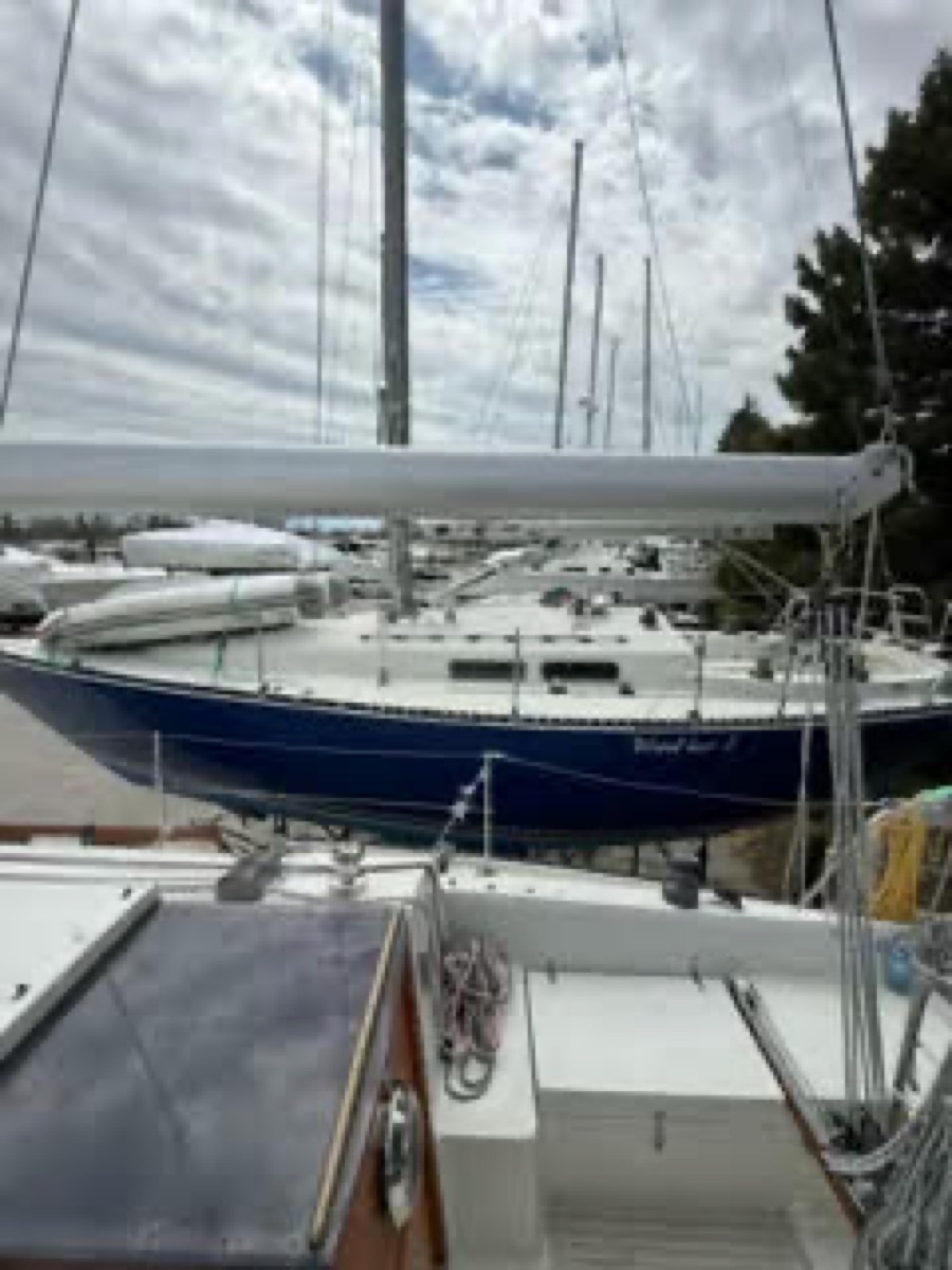 Sailboat with mast at marina detailed by 6ix Auto Care